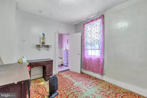 Bedroom - 1606 E Biddle St, Baltimore, MD 21213 photo 1 of 7