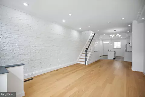 Living - 831 N Luzerne Ave, Baltimore, MD 21205 photo 4 of 8