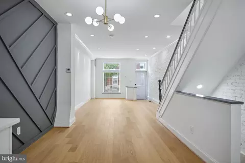Living - 831 N Luzerne Ave, Baltimore, MD 21205 photo 2 of 8