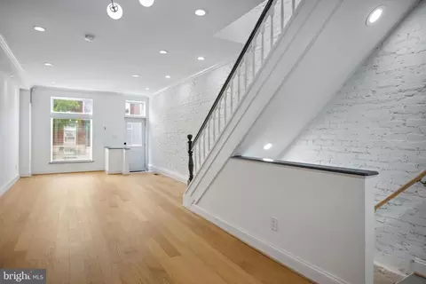 Living - 831 N Luzerne Ave, Baltimore, MD 21205 photo 5 of 8