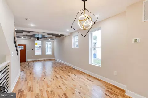Living - 704 Cator Ave, Baltimore, MD 21218 photo 4 of 9