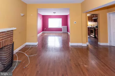 Living - 1631 E 32nd St, Baltimore, MD 21218 photo 2 of 4