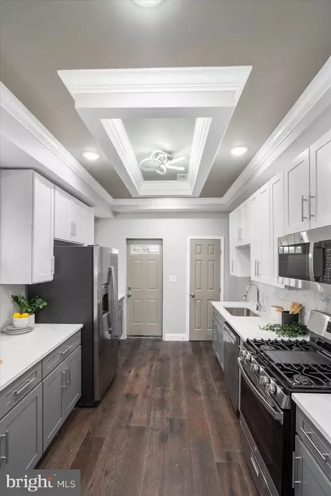 Kitchen - 848 Whitmore Ave, Baltimore, MD 21216 photo 1 of 2