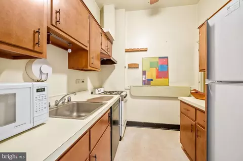 Kitchen - 207 W Lanvale St, Baltimore, MD 21217 photo 1 of 2