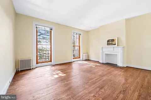 Living - 207 W Lanvale St, Baltimore, MD 21217 photo 5 of 11