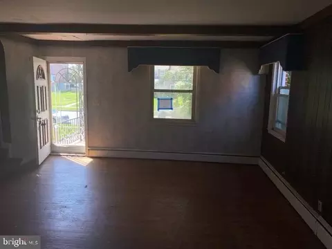 Living - 1212 E Belvedere Ave, Baltimore, MD 21239 photo 1 of 9