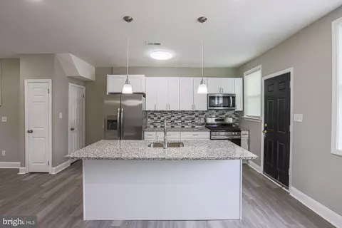 Kitchen - 2506 W Cold Spring Ln, Baltimore, MD 21215 photo 1 of 3