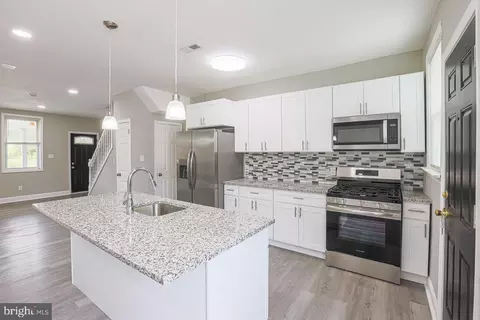 Kitchen - 2506 W Cold Spring Ln, Baltimore, MD 21215 photo 2 of 3