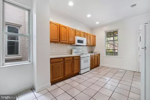 Kitchen - 324 E 28th St, Baltimore, MD 21218 photo 1 of 1