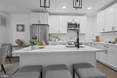 Kitchen - 165 N Monastery Ave, Baltimore, MD 21229 photo 1 of 3