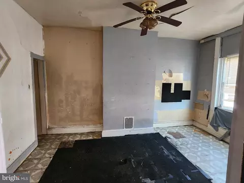 Living - 2115 Walbrook Ave, Baltimore, MD 21217 photo 1 of 2