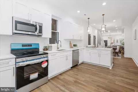 Kitchen - 722 E 21st St, Baltimore, MD 21218 photo 1 of 2