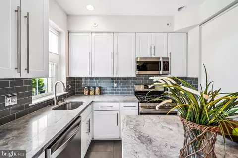Kitchen - 5 N Luzerne Ave, Baltimore, MD 21224 photo 2 of 2