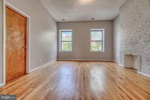 Living - 316 N Paca St, Baltimore, MD 21201 photo 3 of 6