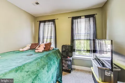 Bedroom - 212 E 22nd St, Baltimore, MD 21218 photo 6 of 12