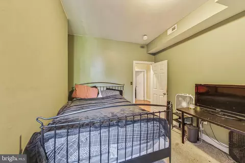 Bedroom - 212 E 22nd St, Baltimore, MD 21218 photo 4 of 12
