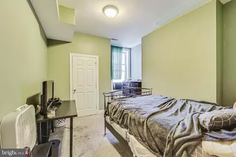 Bedroom - 212 E 22nd St, Baltimore, MD 21218 photo 3 of 12