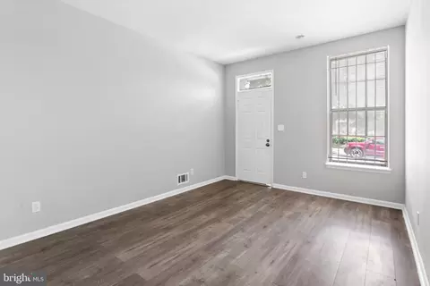 Living - 910 N Eden St, Baltimore, MD 21205 photo 1 of 1