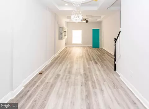 Living - 3026 E Monument St, Baltimore, MD 21205 photo 2 of 2