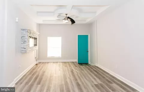Living - 3026 E Monument St, Baltimore, MD 21205 photo 1 of 2