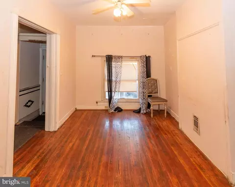 Living - 1206 N Luzerne Ave, Baltimore, MD 21213 photo 1 of 3