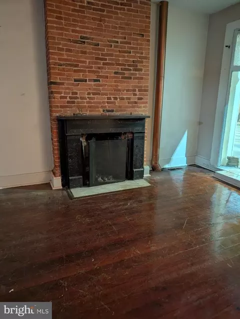 Living - 845 N Howard St, Baltimore, MD 21201 photo 2 of 4