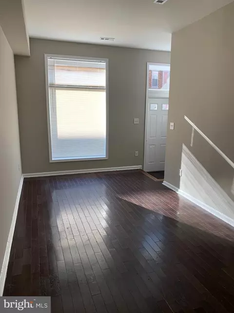 Living - 332 E 22nd St, Baltimore, MD 21218 photo 2 of 3
