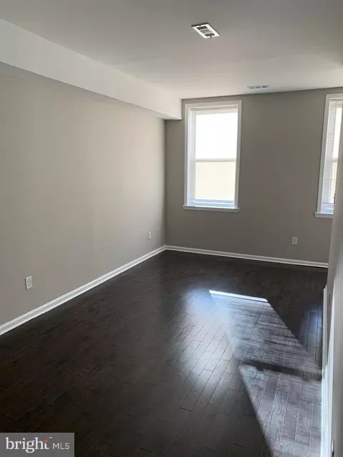 Living - 332 E 22nd St, Baltimore, MD 21218 photo 3 of 3