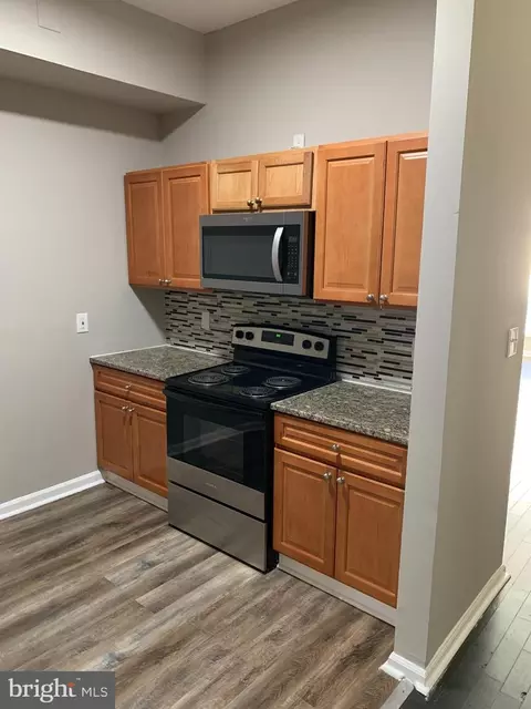 Kitchen - 332 E 22nd St, Baltimore, MD 21218 photo 2 of 4