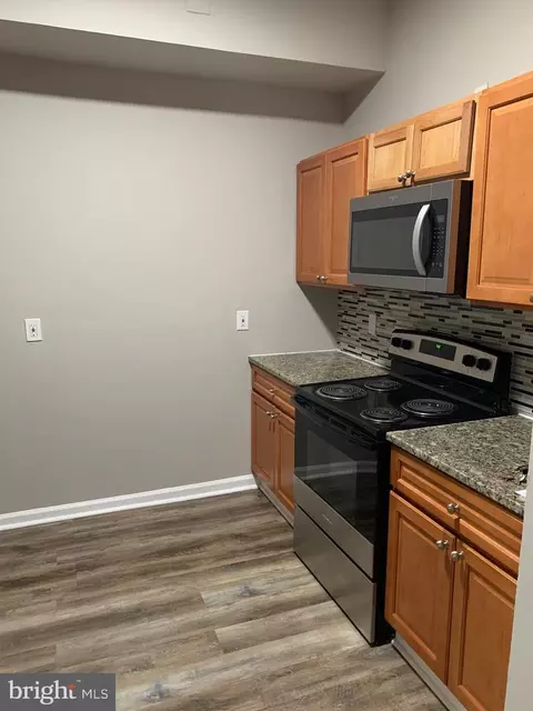 Kitchen - 332 E 22nd St, Baltimore, MD 21218 photo 1 of 4