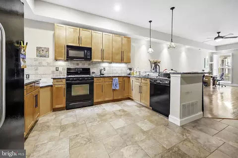 Kitchen - 2735 N Calvert St, Baltimore, MD 21218 photo 1 of 7