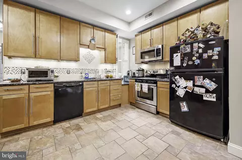 Kitchen - 2735 N Calvert St, Baltimore, MD 21218 photo 4 of 7