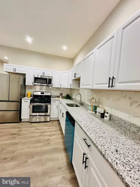 Kitchen - 710 E 21st St E, Baltimore, MD 21218 photo 4 of 5