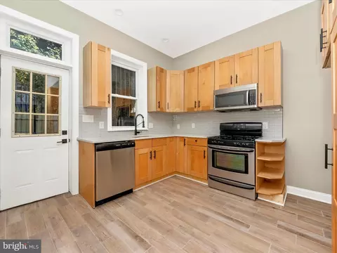 Kitchen - 310 E 25th St, Baltimore, MD 21218 photo 1 of 3