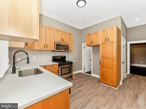 Kitchen - 310 E 25th St, Baltimore, MD 21218 photo 2 of 3