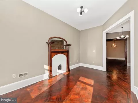 Living - 310 E 25th St, Baltimore, MD 21218 photo 4 of 11