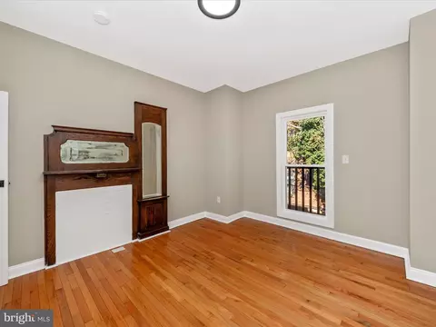 Bedroom - 310 E 25th St, Baltimore, MD 21218 photo 5 of 7