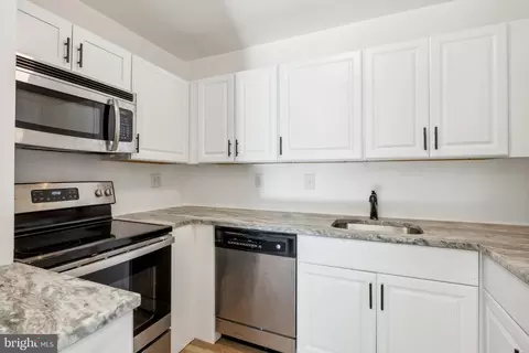 Kitchen - 312 E 22nd St, Baltimore, MD 21218 photo 2 of 2
