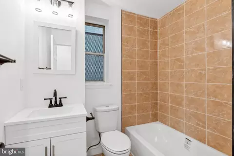 Bath - 312 E 22nd St, Baltimore, MD 21218 photo 2 of 2