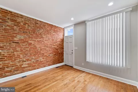 Living - 2235 E Chase St, Baltimore, MD 21213 photo 1 of 1