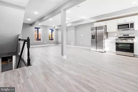 Living - 1625 E 32nd St, Baltimore, MD 21218 photo 1 of 1