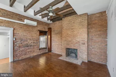 Living - 845 E Lombard St E, Baltimore, MD 21202 photo 1 of 6
