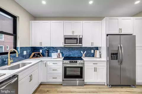 Kitchen - 709 E 21st St, Baltimore, MD 21218 photo 2 of 2
