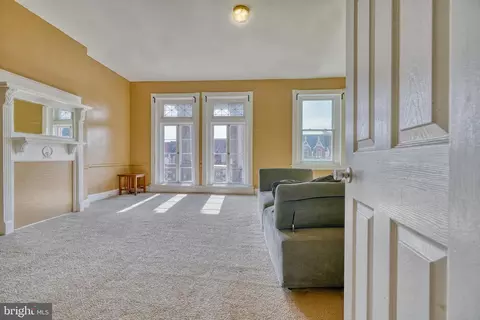 Living - 2323 Eutaw Pl, Baltimore, MD 21217 photo 11 of 16