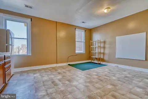 Living - 2323 Eutaw Pl, Baltimore, MD 21217 photo 10 of 16
