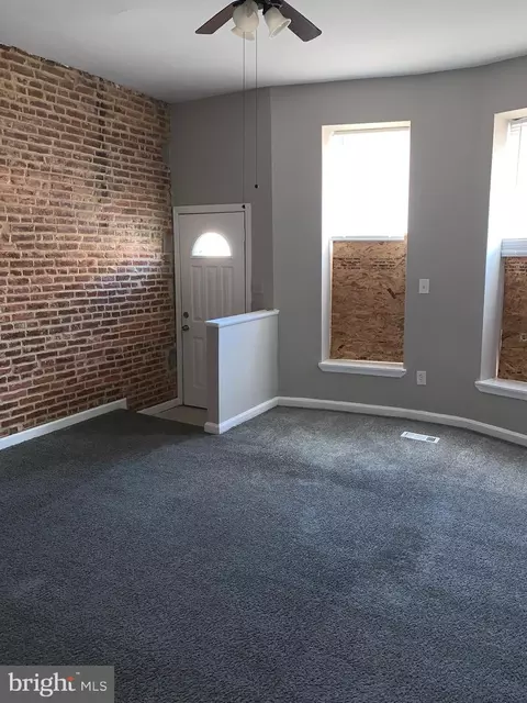 Living - 1701 E Lafayette Ave, Baltimore, MD 21213 photo 3 of 4