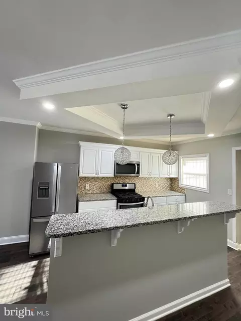 Kitchen - 718 N Luzerne Ave, Baltimore, MD 21205 photo 2 of 2