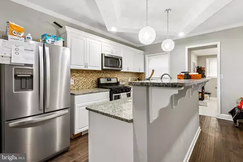 Kitchen - 718 N Luzerne Ave, Baltimore, MD 21205 photo 1 of 2