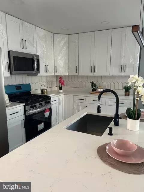 Kitchen - 5211 W North Ave, Baltimore, MD 21207 photo 2 of 2