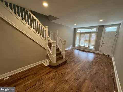 Living - 831 Belgian Ave, Baltimore, MD 21218 photo 3 of 5